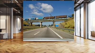 Logistic freight train over the bridge.   Wall mural