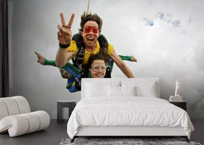 Skydiving tandem happiness on a cloudy day Wall mural