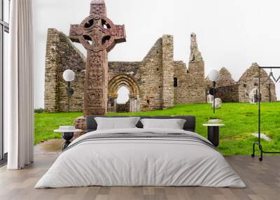 The monastic city of Clonmacnoise with the typical crosses, Ireland Wall mural