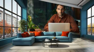 Businessman working late at his desk in an office Wall mural