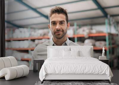 Warehouse manager smiling while using a digital tablet  Wall mural