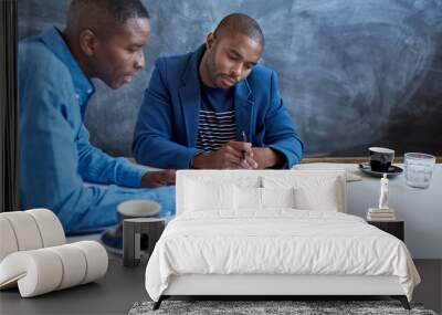 young african businessmen working together in a modern office Wall mural