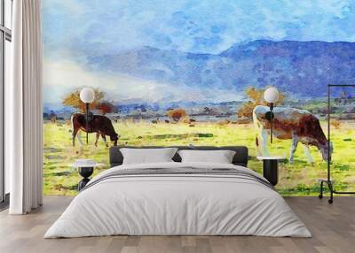 Two cows graze peacefully in a meadow at the foot of the mountain. Digital watercolors Wall mural