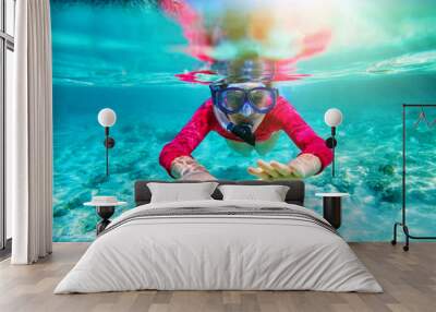 Girl swimming underwater Wall mural