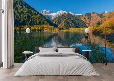 Picturesque mountain lake Issyk in the outskirts of the Kazakh city of Almaty on an autumn morning Wall mural