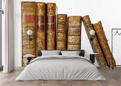 Row of antique books with a leather cover and golden ornaments on isolated on white background Wall mural