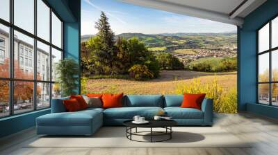 View of the little town of Rio Salso from Belvedere Fogliense, in the Marche region of Italy. The village of Montefabbri, the town of Urbino and the mounts Nerone and Catria appear in the background Wall mural