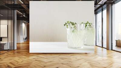 Cocktail in old fashioned glass on the wooden background Wall mural