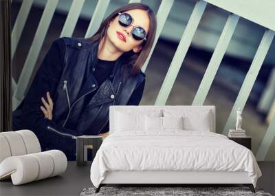 fashion model in sunglasses posing outdoor Wall mural