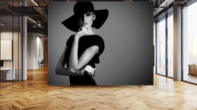 high fashion portrait of elegant woman in black and white hat an Wall mural