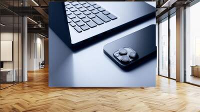 Laptop with smartphone. Close up image. Wall mural