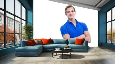 Portrait of a young handsome man wearing blue t-short isolated o Wall mural