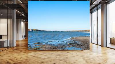 Autumn river ships standing and fisherfolk on river shore Wall mural