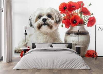 A black and white dog is resting on a table with a vase of flowers Wall mural