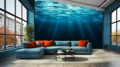 An ocean or sea deep background with sunbeams. Wall mural