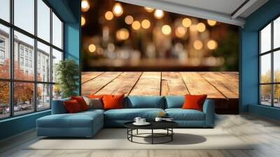 Decorative wood texture table top (counter bar) with blurry light gold bokeh in a restaurant or cafe Wall mural