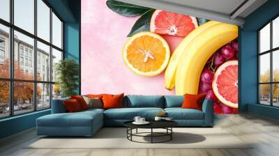 Various fresh fruits on a pink background. Summer banner with copy space Wall mural