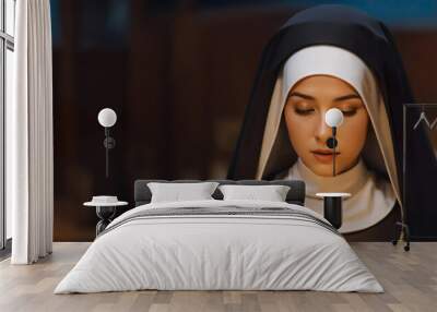 Portrait of pretty young adult catholic nun. front view cute Girl with closed eyed. night scene. empty copy space for inscription. 16:9 horizontal format. black and white uniform. Generative ai. Wall mural