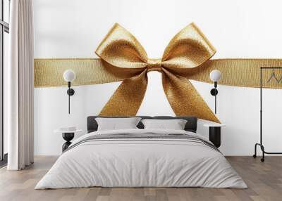 Elegant gold ribbon bow for gift presentation decoration. Wall mural