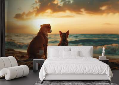 Dog and cat sitting on a sandy beach during sunset Wall mural