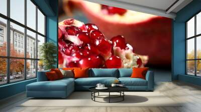  Ripe and juicy pomegranate broken into pieces, closeup Wall mural