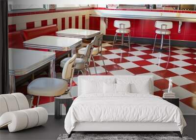 The image shows a retro diner interior with white and red checkered floor tiles, red cushioned booths, and white tabletops. Wall mural