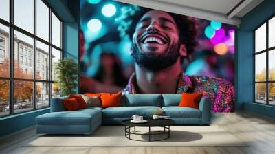 A cheerful man wearing a dazzling shirt basks in colorful nightclub lights, embodying the carefree happiness and thrill of a vibrant party atmosphere. Wall mural