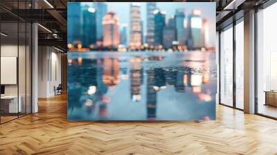 A cityscape with illuminated skyscrapers reflecting on a wet surface during dusk, creating a stunning visual effect, highlighting the beauty of urban life and rainy city evenings. Wall mural