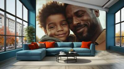 A joyful father and his young child share a heartfelt embrace outdoors, capturing a moment of warmth, love, and family connection under the soft sunlight. Wall mural