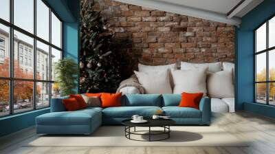 A warm and inviting living room scene featuring a cozy white couch, a beautifully decorated Christmas tree, and a rustic brick wall background, embodying festive comfort. Wall mural