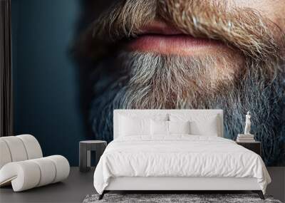 Detailed close-up of a gray and white beard of a man, capturing the texture and shades of the facial hair, indicative of age and wisdom. Wall mural