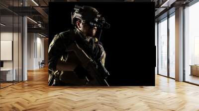 US marine corps soldier with weapon. Shot in studio. isolated with clipping on black background. Wall mural