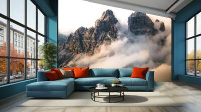 Aerial moody landscape of Tre Cime di lavaredo mountains in cloudy day, Dolomites, Alps, South Tyrol, Italy. Wall mural