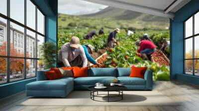 A group of people are picking strawberries in a field. Scene is peaceful and serene, as the workers are surrounded by nature and the beauty of the countryside Wall mural