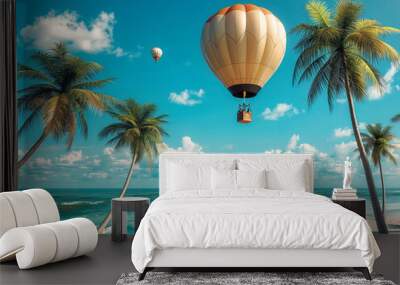 A hot air balloon is flying over a beach with palm trees. The sky is clear and blue, and the ocean is calm. The scene is peaceful and relaxing, with the hot air balloon adding a sense of adventure Wall mural