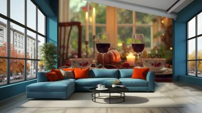 A table with two wine glasses and two bowls of food. The table is set for a romantic dinner Wall mural