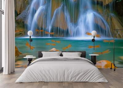 A waterfall with a group of dragonflies flying over it. The water is clear and the rocks are brown Wall mural