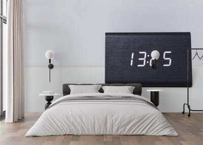 Black digital clock on a white background showing time 13:25 Wall mural