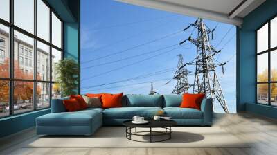 Electricity concept, high voltage power lines. High voltage electric transmission pylon silhouetted tower. Wire electrical energy Wall mural