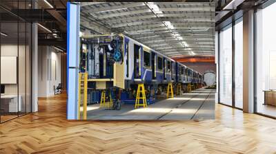 Inside of the rail car assembly plant. Industrial workshop for the production of European high speed trains. Factory of the manufacturing trainsets rolling stock for subway - Image Wall mural