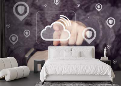 Businessman presses button cloud signal service secure network. Wall mural