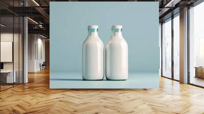 Two milk bottles on light blue background Wall mural