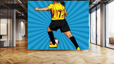 Woman Football player dribble ball in the game  Wall mural