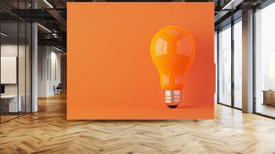 A close-up of an orange lightbulb against a plain background, with soft, diffused lighting to create a calming and minimalist atmosphere. The image is ideal for projects that need a simple yet Wall mural