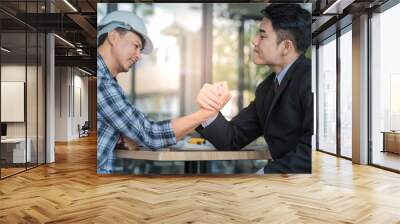 Young business man Arm wrestle together, competition concepts. Wall mural