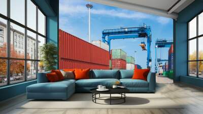 Containers on the wharf. International shipping logistics. Wall mural