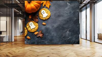 Halloween autumn concept. A cup of tea or coffee, pumpkin and oatmeal cookies on a dark stone table. Wall mural