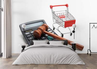 Caculator with Shopping Cart and Wooden judge gavel isolated on white background Wall mural