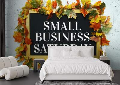 Small Business Saturday typography text on wooden blackboard hanging with maple leaf decoration Wall mural