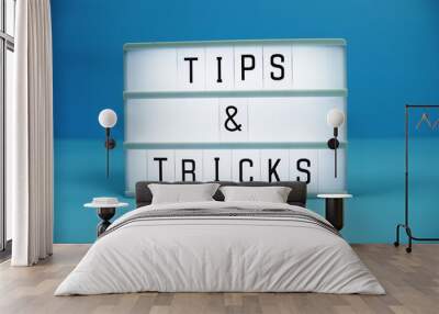 Tips & Tricks letterboard text on LED Lightbox on blue background Wall mural